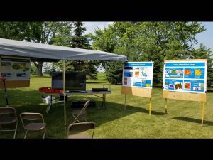 Outdoor tent with poster board presentations